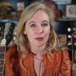 AI song generator startups Suno and Udio angered the music industry. Now they're hoping to join it