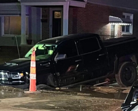Sinkhole forms in Detroit, damages truck that tried to drive through