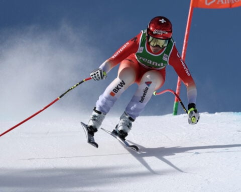 Swiss skier Suter wins 1st race since Olympics as chase starts for Vonn's World Cup downhill lead