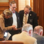 2 trans men sue Kansas over a law invalidating their driver's licenses and about 1,700 others