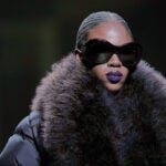 Kate Moss closes Demna's first Gucci show in a plunging gown and branded thong