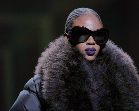 Kate Moss closes Demna's first Gucci show in a plunging gown and branded thong