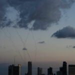 In familiar ritual, Israelis race back and forth to shelters to escape Iranian missile barrages