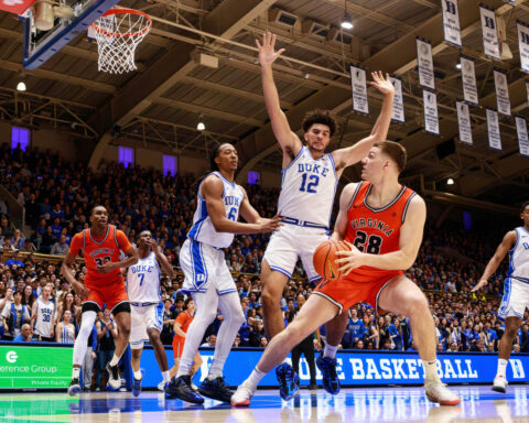 Evans, Boozer help No. 1 Duke beat No. 11 Virginia 77-51 to clinch ACC Tournament's top seed