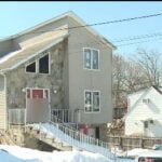 Hateful symbols removed from home after months of complaints from neighbors