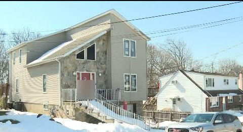 Hateful symbols removed from home after months of complaints from neighbors