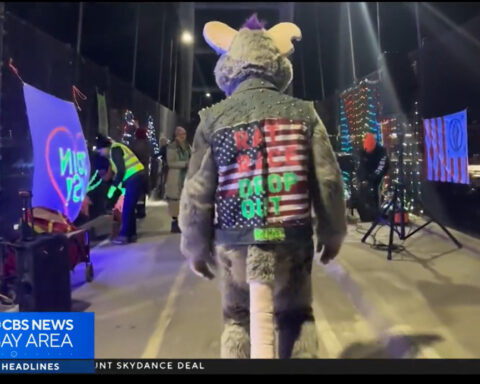 Group holds dance parties on overpass to call for peace in politics