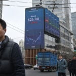 Stocks fall and oil surges as war with Iran spreads