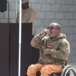 Shooting survivor uses music to reach youth at Stop the Violence rally