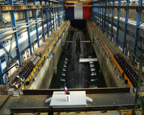 Macron says France will allow temporary deployment of nuclear-armed jets to European allies