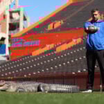 Florida coach Jon Sumrall's photoshoot with a 7-foot alligator includes some tense moments