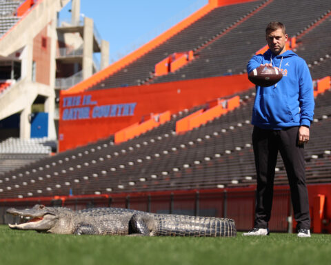 Florida coach Jon Sumrall's photoshoot with a 7-foot alligator includes some tense moments