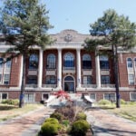 An Arkansas man accused of killing his daughter's alleged abuser wins GOP sheriff's nomination