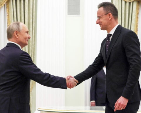 Putin hosts Hungary's foreign minister for energy supply talks as war in Mideast causes disruptions