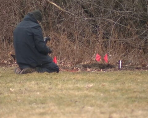 Mother of 2 girls found in shallow graves in Cleveland charged with murder