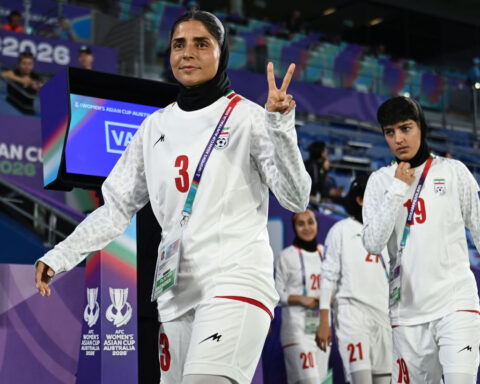 Iranian women’s soccer team forced to sing national anthem ahead of Asian Cup match, sources tell CNN