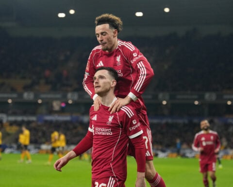 Robertson and Salah shine as Liverpool hits back to beat Wolves and reach FA Cup quarterfinals