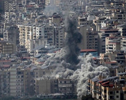 The Latest: Trump says he’ll hit Iran harder as Iranian president apologizes to neighbors