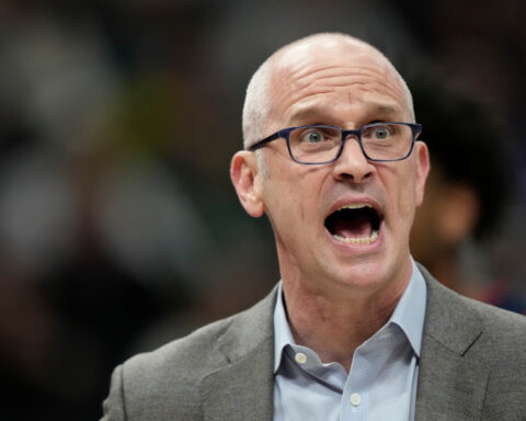 Hurley ejected in final second of Marquette's 68-62 win over No. 4 UConn