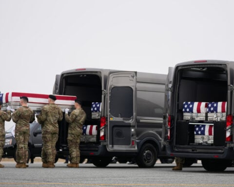 Trump grieves with families during return of soldiers killed in war in the Middle East