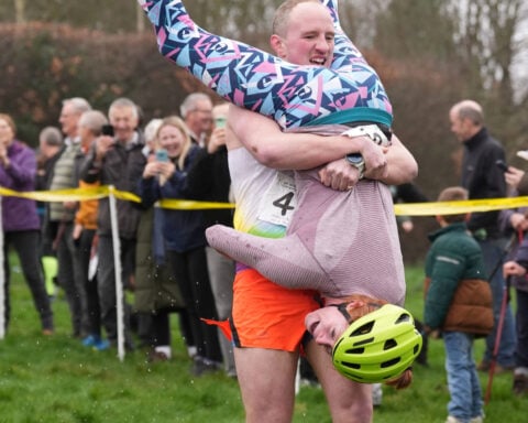 Finnish pair wins a barrel of ale in annual 'wife-carrying' contest in England