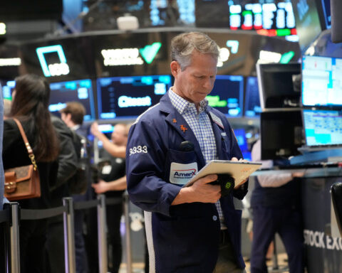 US stocks erase a big early loss and rise after oil prices whip from nearly $120 back below $90