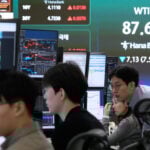 Asian shares surge, echoing a rally on Wall Street as oil prices sank back to about $90