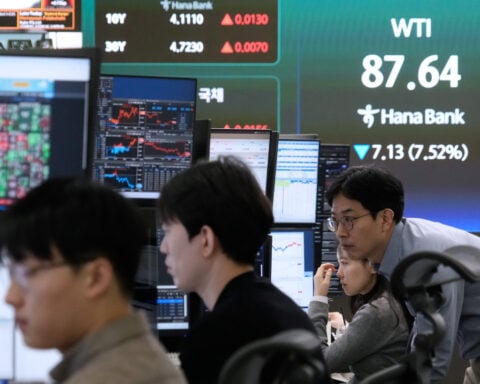 Asian shares surge, echoing a rally on Wall Street as oil prices sank back to about $90