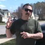 Off-duty firefighter uses gear, garden hose to knock down house fire