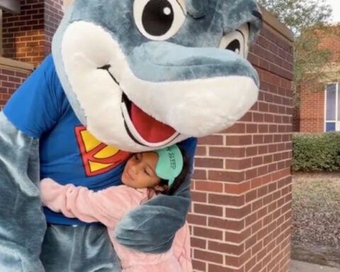 Hero Dads turn school carpool line into a morning celebration