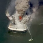 Massive fire breaks out aboard scrap metal barge on Delaware Bay