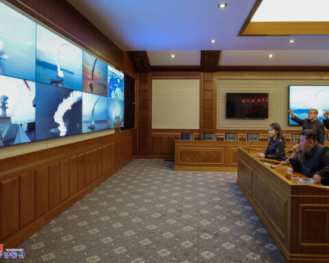 North Korean leader Kim watches cruise missile tests with his daughter