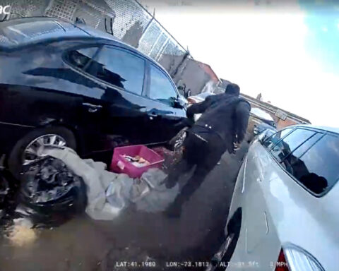 Officer having 'anxiety attack' took ambulance sent for man dying from police shooting, report says