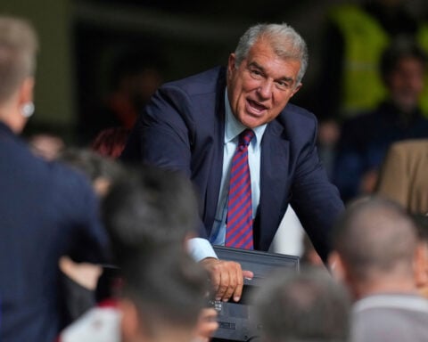 FC Barcelona's 100,000-plus members vote for president with club buried under a mountain of debt