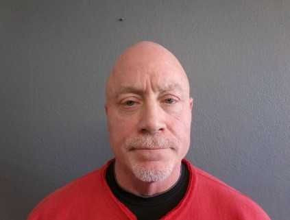 Man charged after shooting family dog in head from window, police say