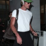 Look of the Week: Harry Styles proves that ‘It-bags’ are for the boys, too