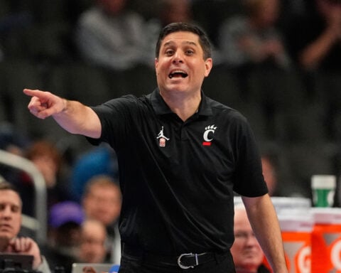 Cincinnati firing men's basketball coach Wes Miller, AP sources say