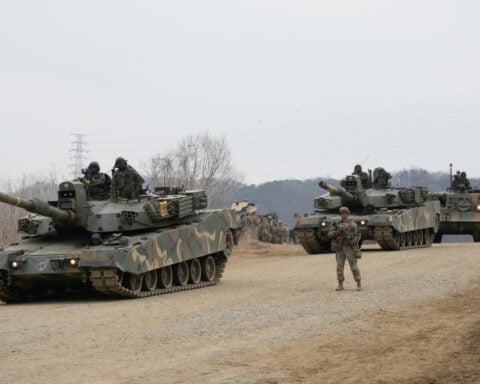 North Korea fires about 10 missiles toward sea in show of force, Seoul says