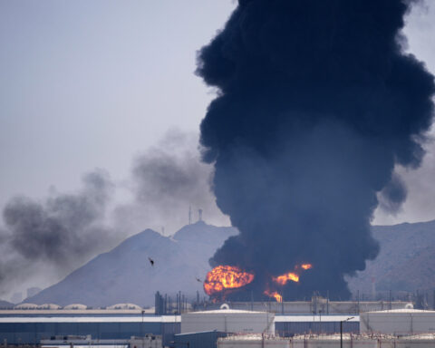 The Latest: Iran threatens UAE ports as war enters its third week