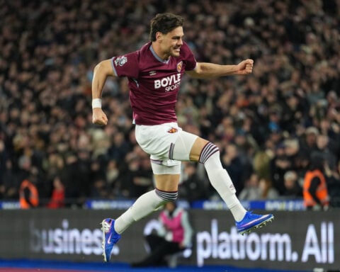 Arsenal strengthens grip on title race as Dowman becomes youngest ever Premier League scorer