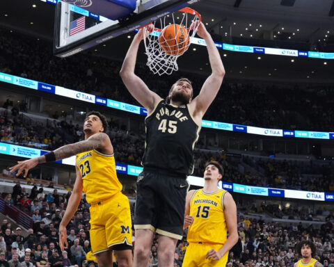 Cluff and Kaufman-Renn power No. 18 Purdue past No. 3 Michigan 80-72 in Big Ten final
