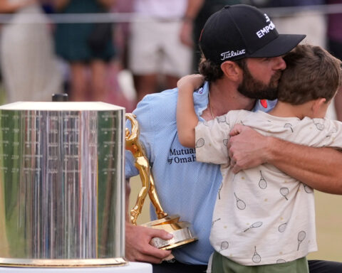 Cameron Young is clutch on the island green and rallies to win The Players Championship