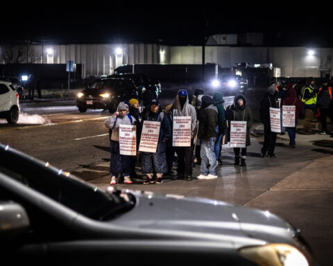 Thousands of meatpacking workers walk off job in first strike in 40 years