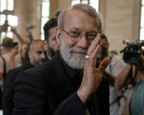 A look at the top Iranian official and the head of internal security targeted by Israel