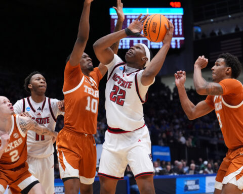 Tramon Mark's late jumper gives Texas a 68-66 win over NC State in the First Four
