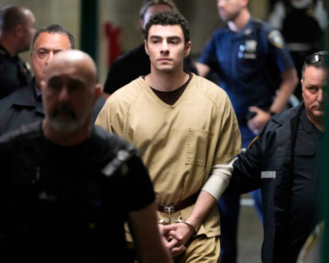 Luigi Mangione's lawyers seek to delay his state and federal trials