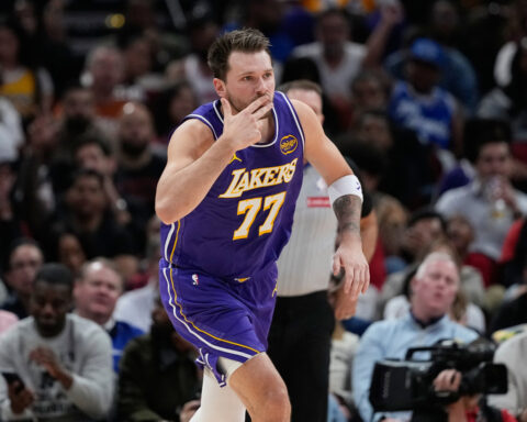 Doncic drops 40, James adds 30 as Lakers stretch their streak to 7 with 124-116 win over Rockets