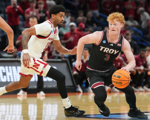 Nebraska gets its first NCAA Tournament win, beating Troy 76-47 behind Pryce Sandfort's 23 points