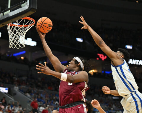 A classic buzzer-beater moment highlighted Friday’s action in the NCAA tournament. Here’s what you need to know