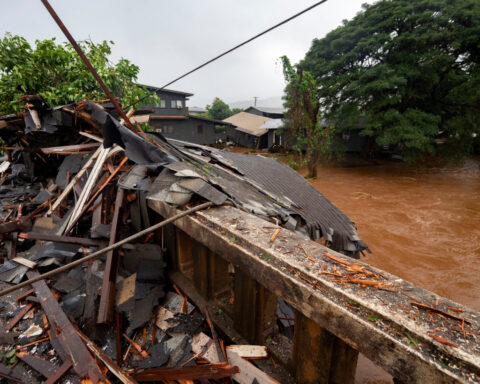 230 people are rescued as flash flooding hits Hawaii and officials warn 120-year-old dam could fail